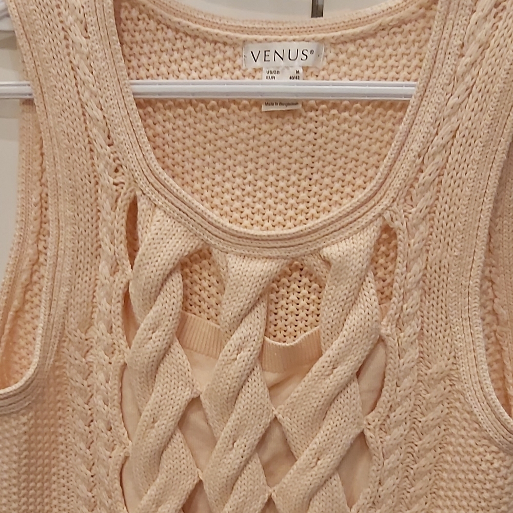Venus sleeveless sweater.